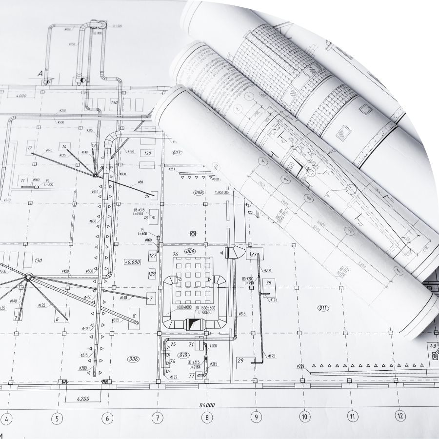 Blueprints showing building designs and offering IT Support for Architecture.